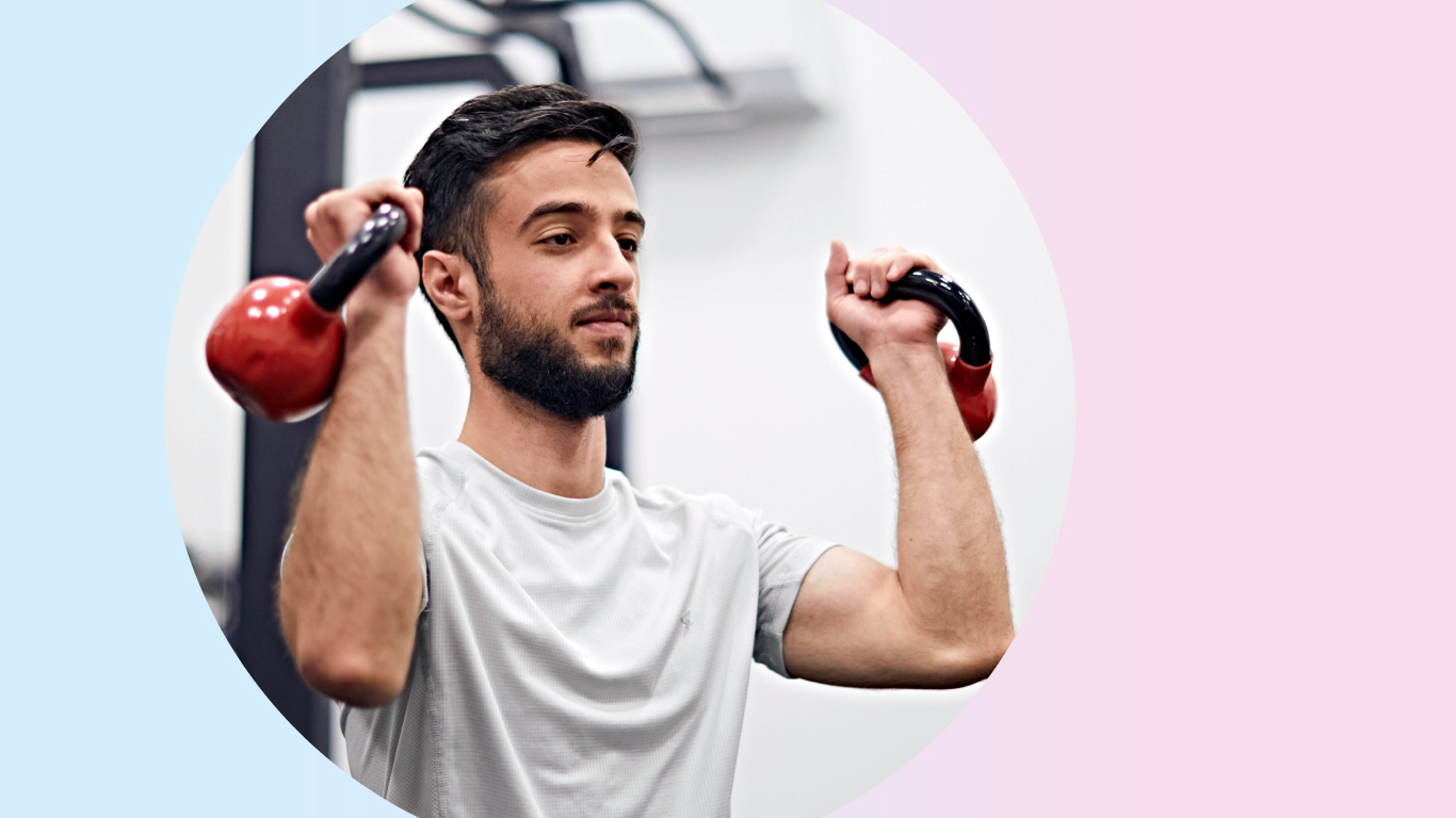 Picture of man lifting kettle bells