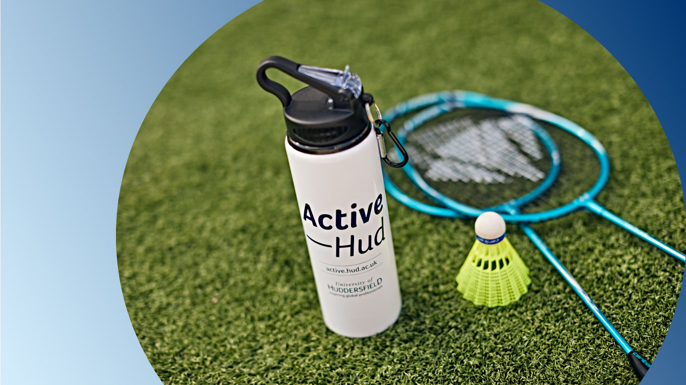 Badminton equipment and ActiveHud waterbottle on grass