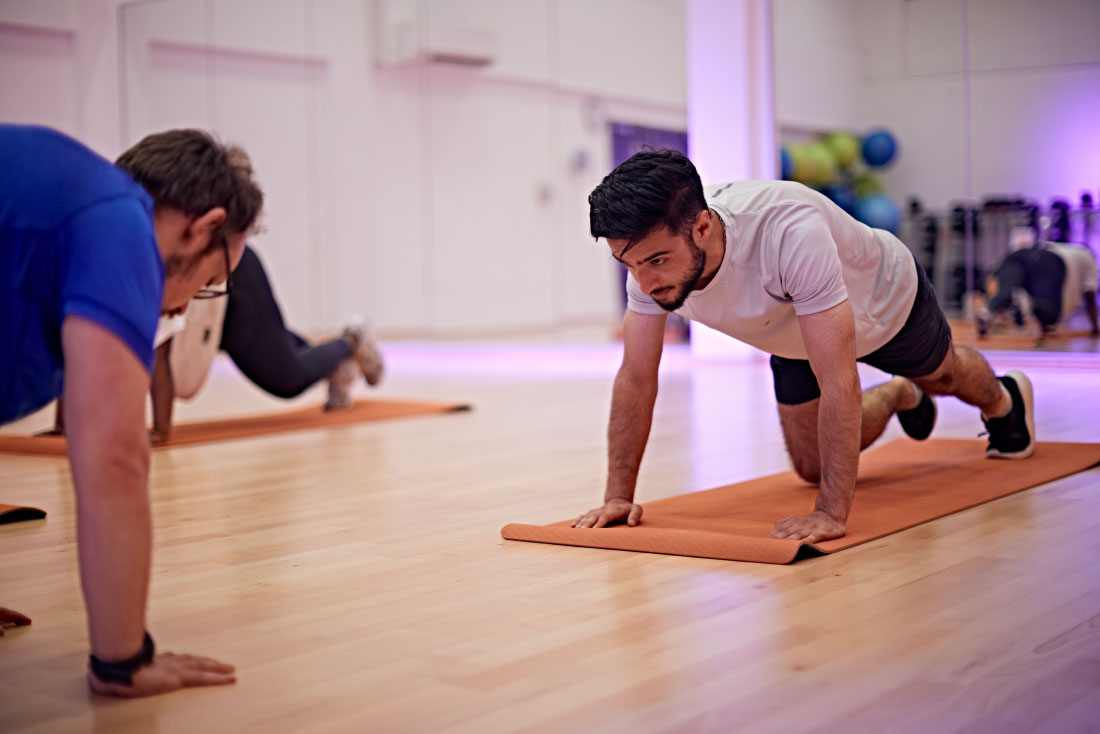 People exercising in fitness class
